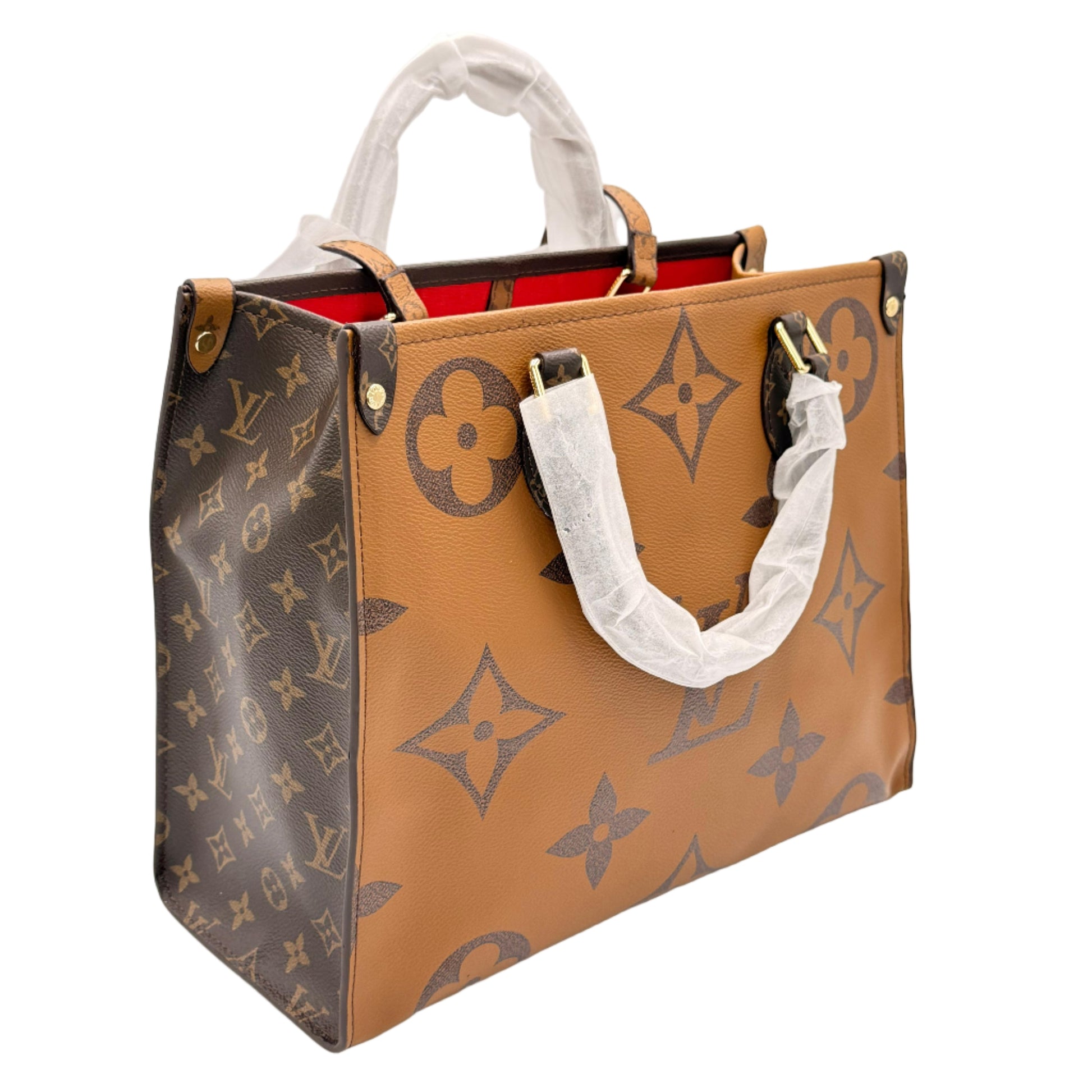 Designer handbag with monogram pattern on a white background