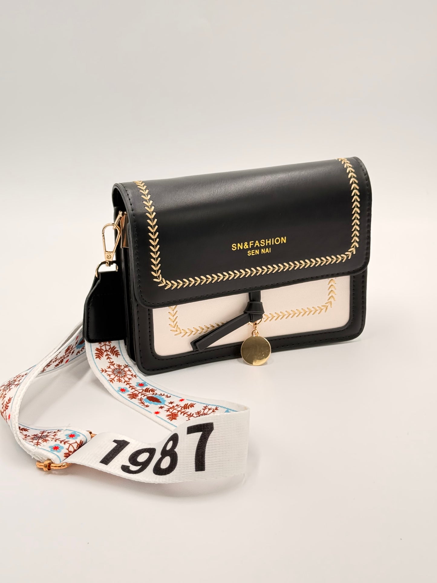 beige black small bag