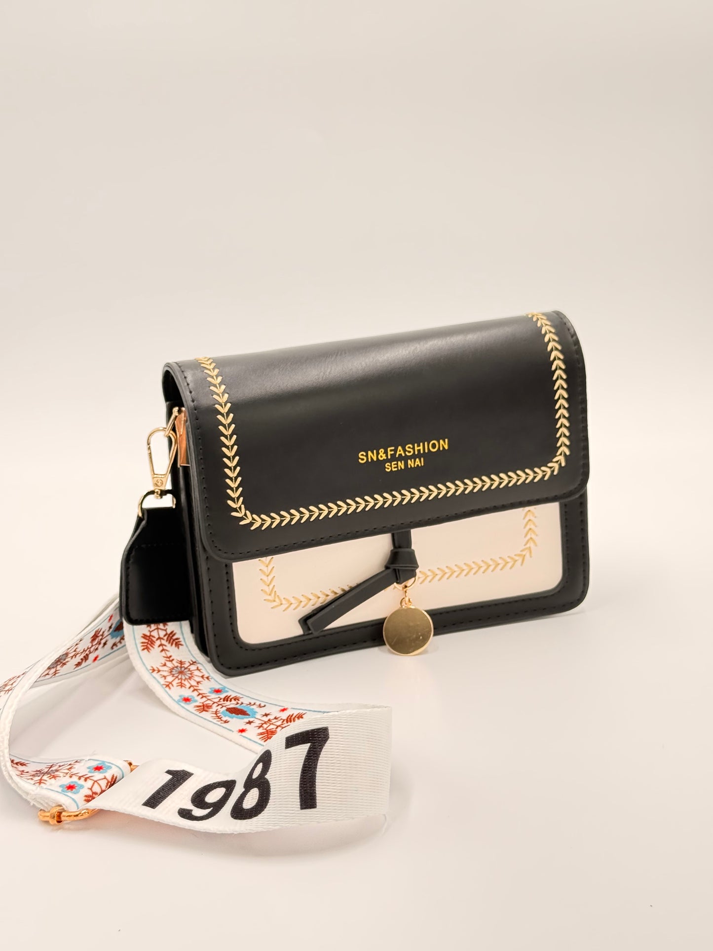 beige black small bag
