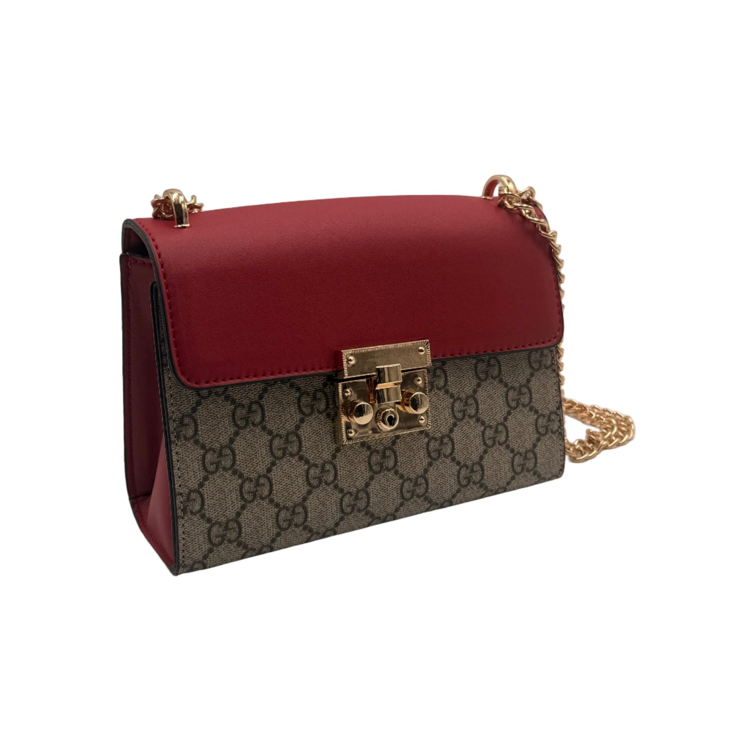 Designer handbag with red leather and patterned body on a light gray background