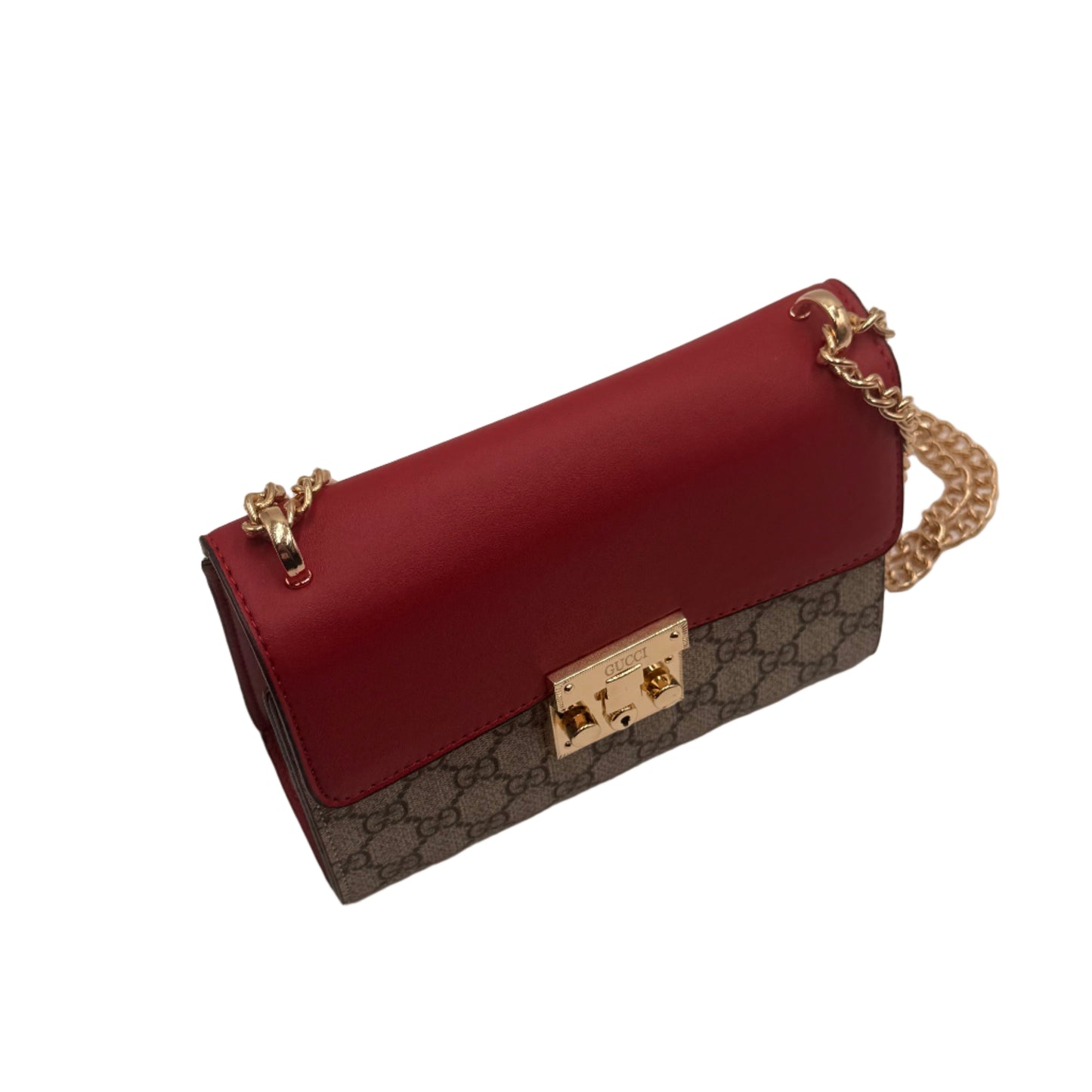 Red handbag with gold chain and clasp on a light gray background
