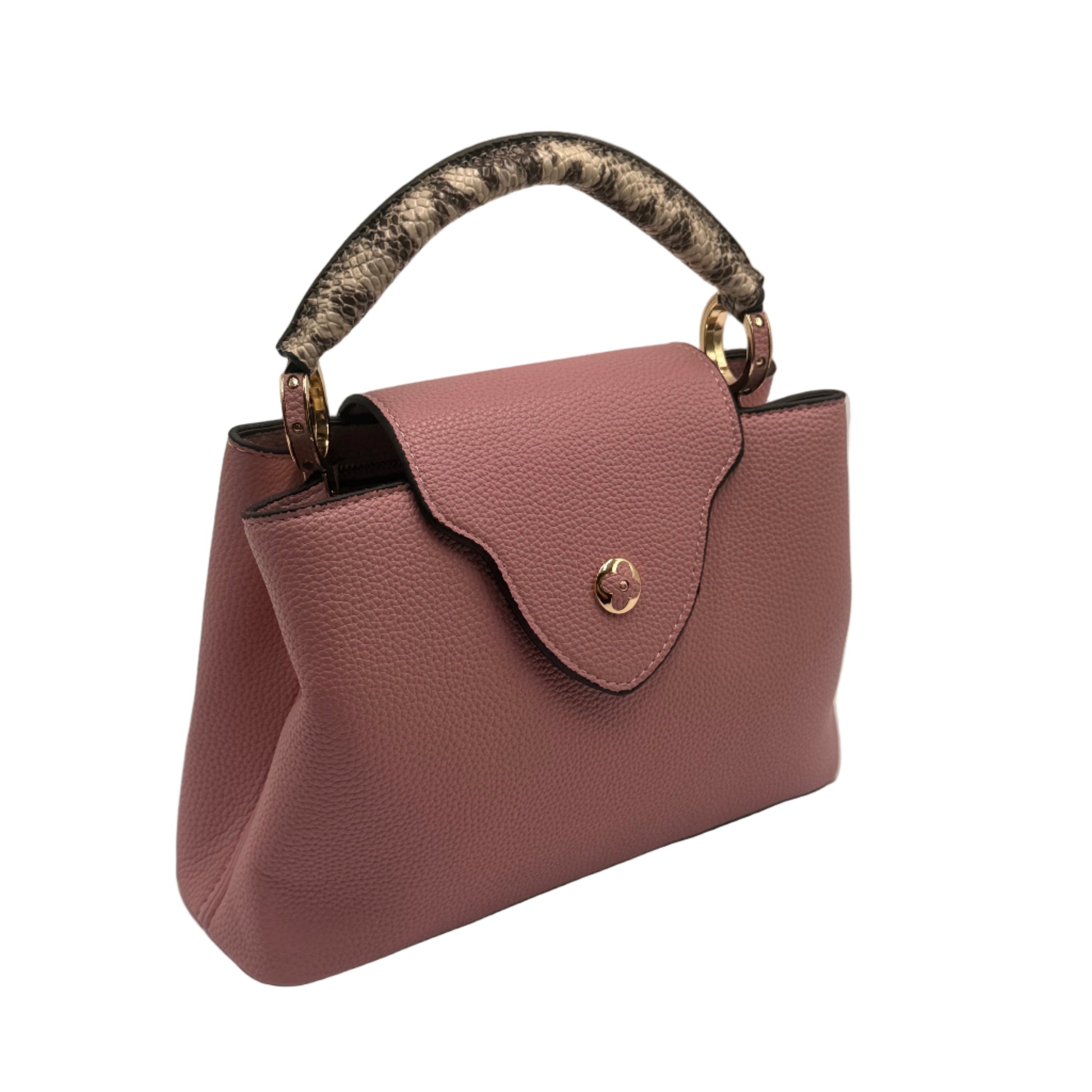 Pink handbag with a patterned handle on a light gray background