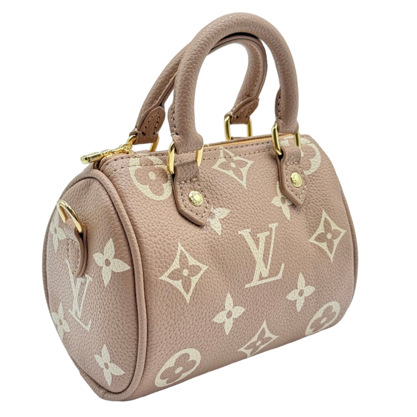 Beige handbag with monogram pattern on a light blue background
