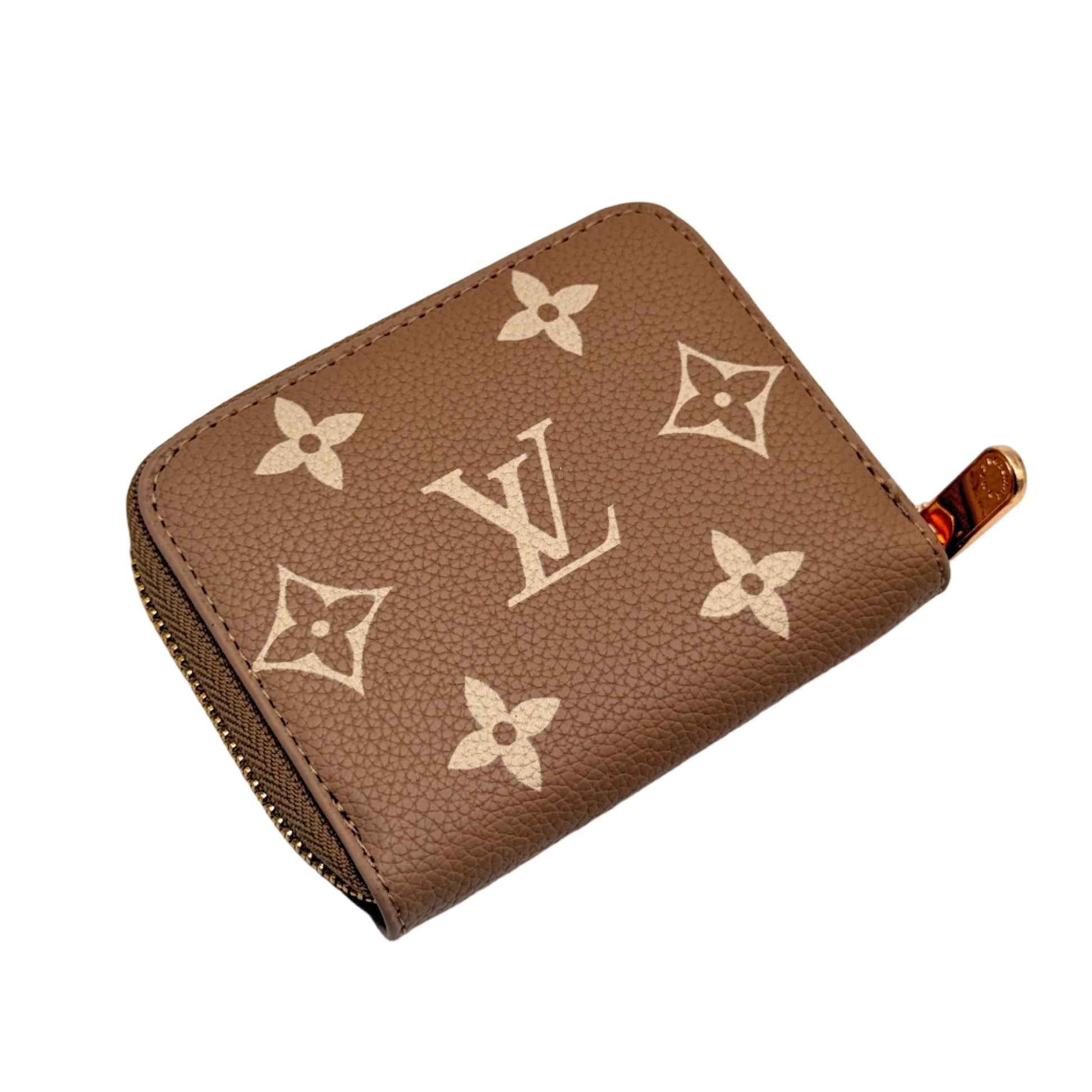 Brown wallet with brand logo on a light gray background