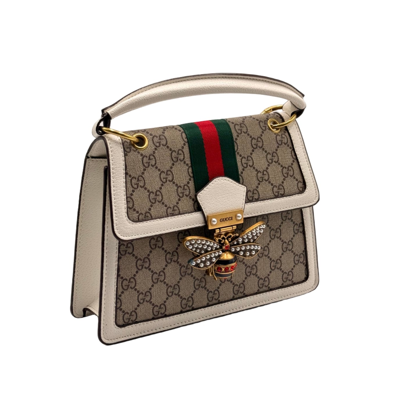 Designer handbag with bee emblem and Gucci logo on a light gray background