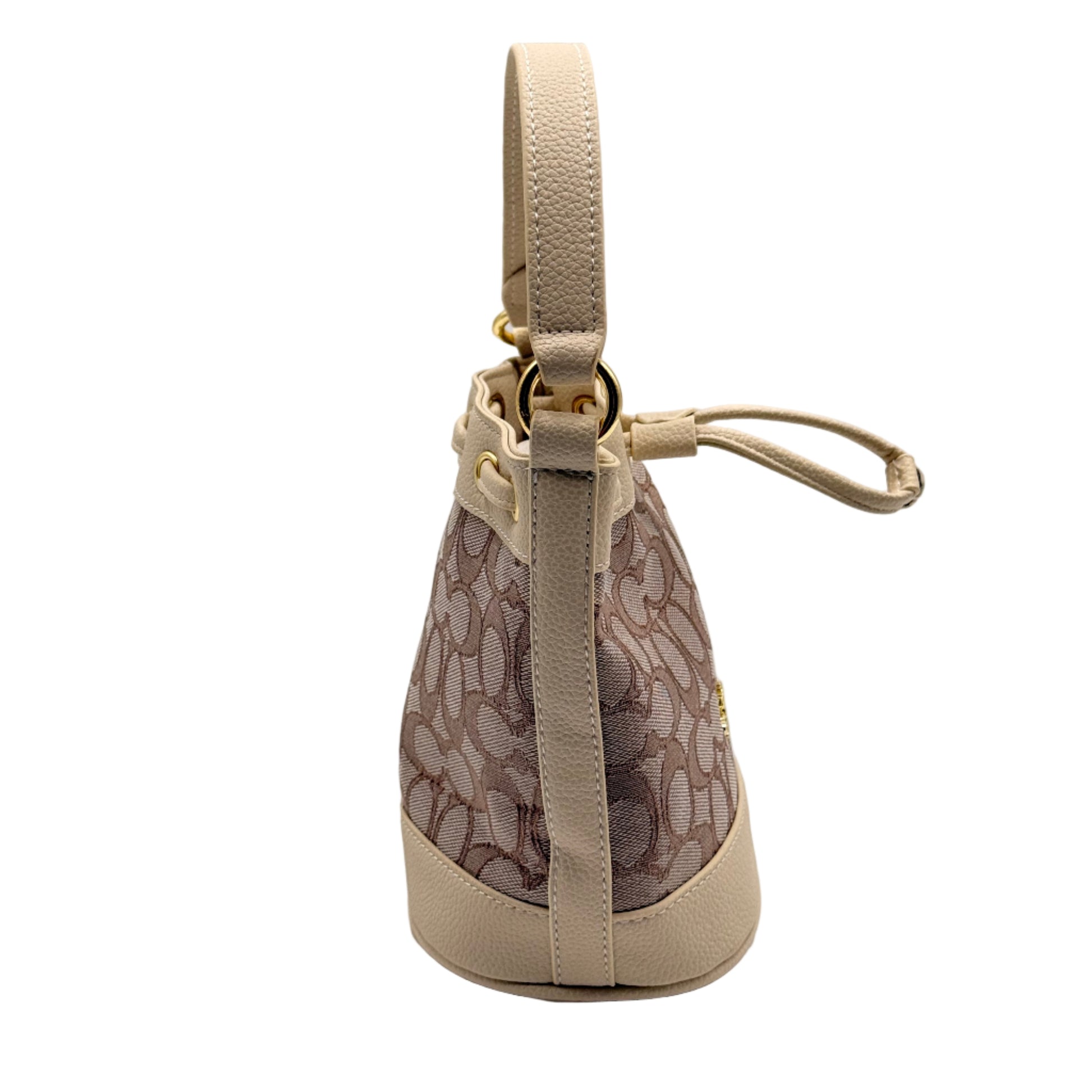 Dog muzzle with beige strap and patterned design on a light gray background