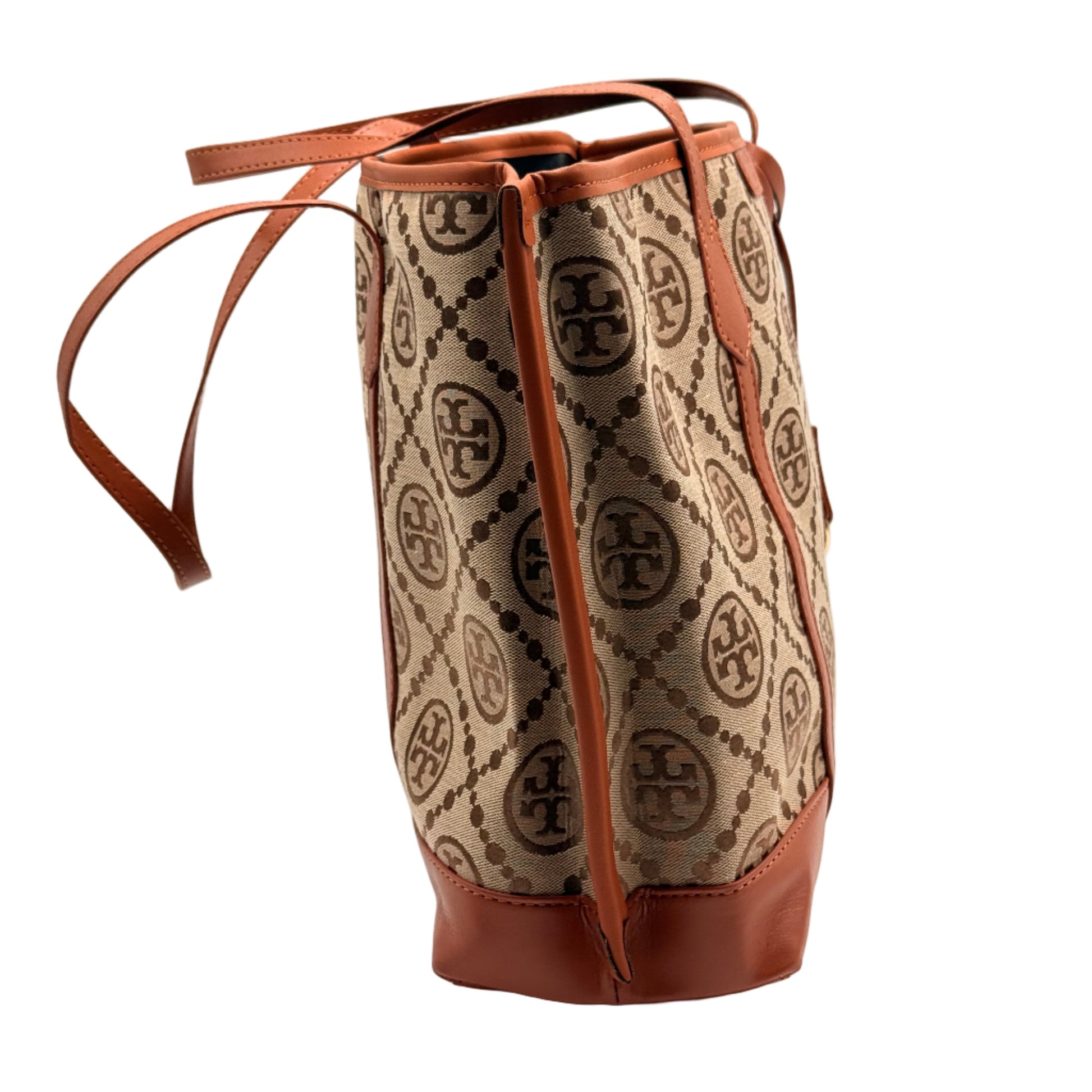 Designer handbag with brand logo on a light background