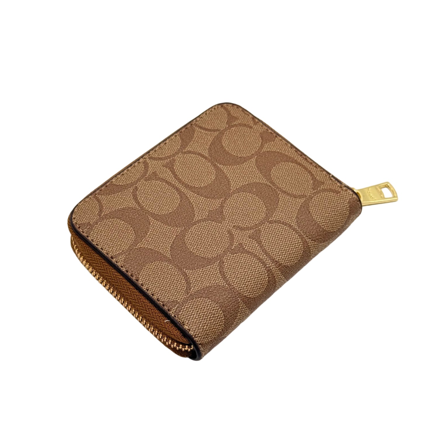 Beige wallet with a gold zipper on a beige background