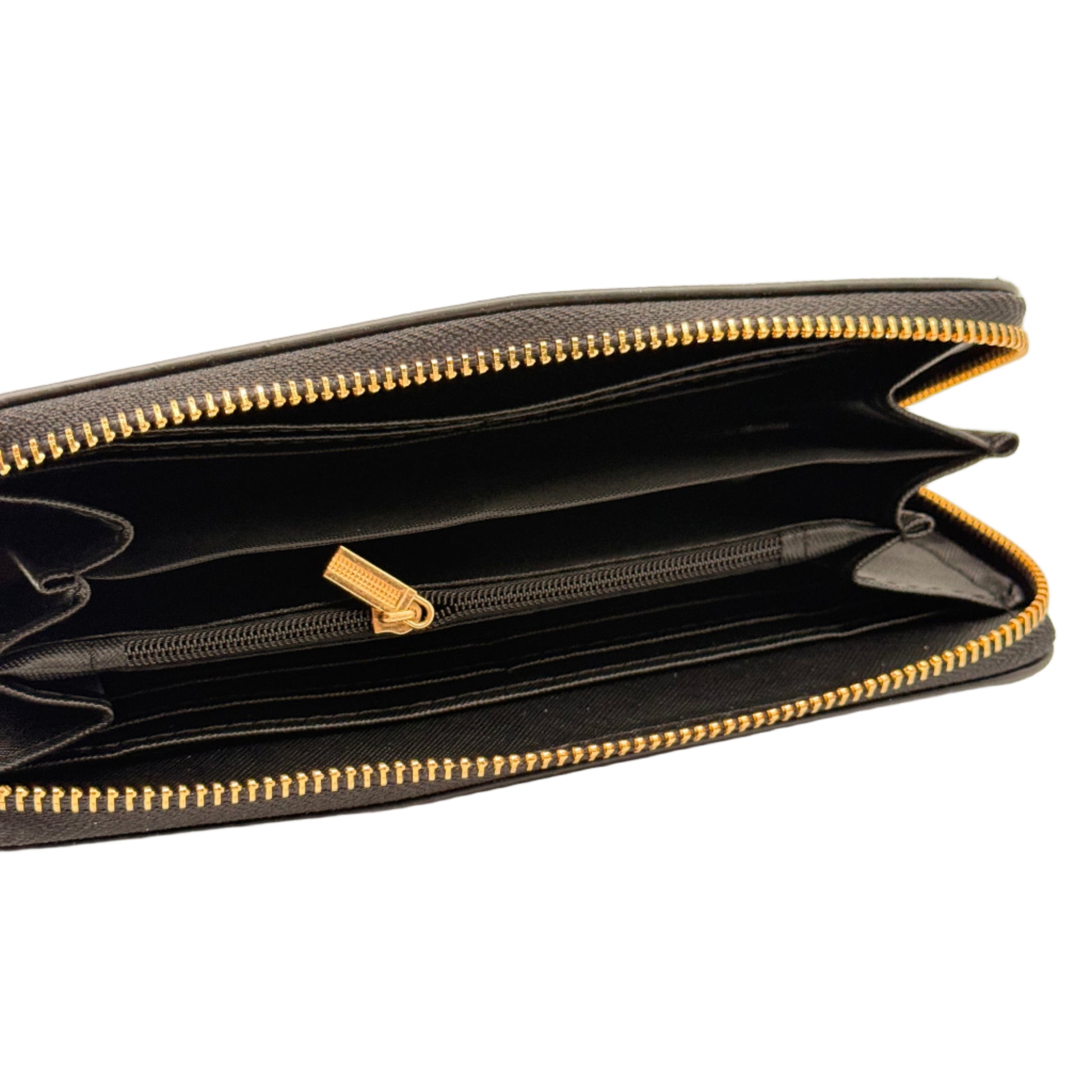 Black wallet with gold zipper on a beige background
