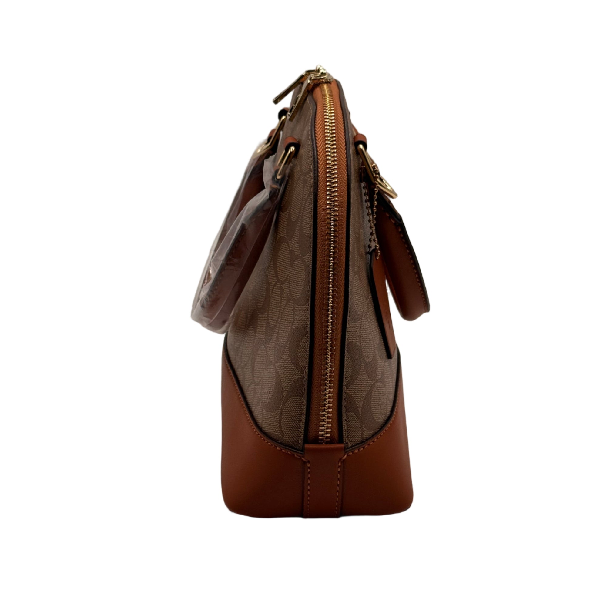 Brown leather handbag with gold zipper on a light gray background