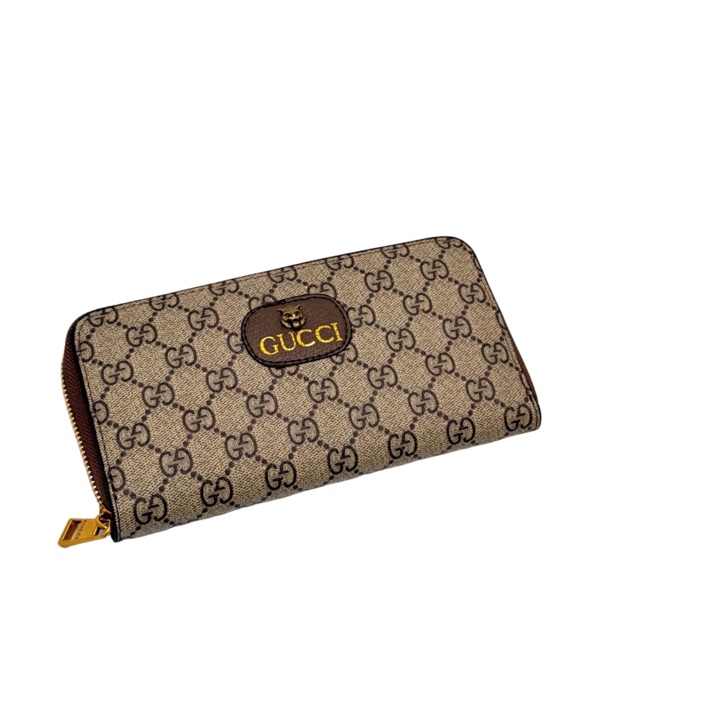 Beige Gucci wallet with logo on a light beige background