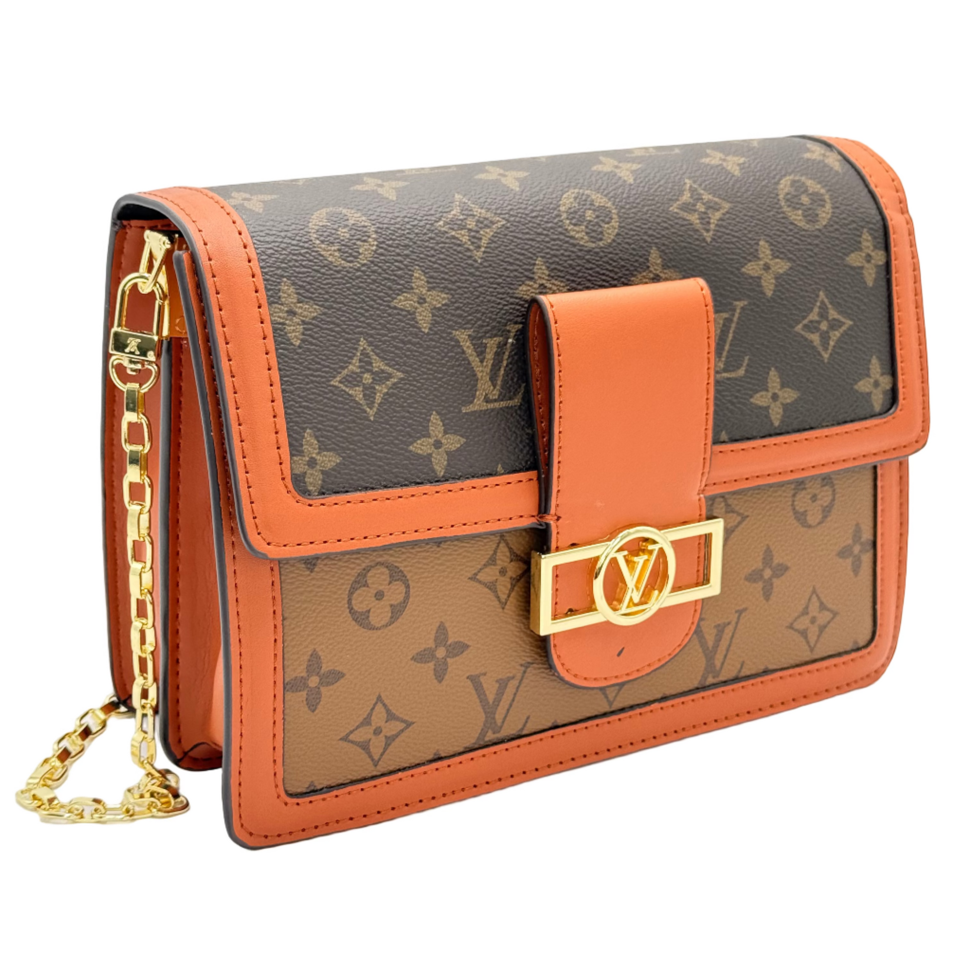 Designer handbag with monogram pattern and orange accents on a light gray background