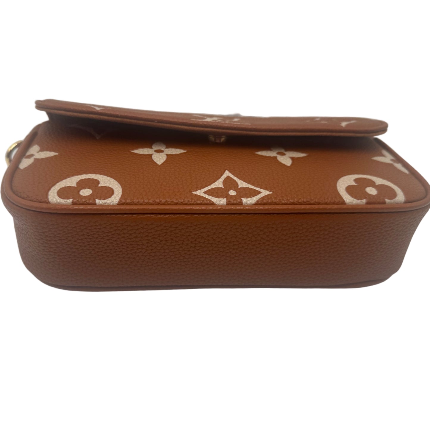 Brown handbag with white logo pattern on a white background