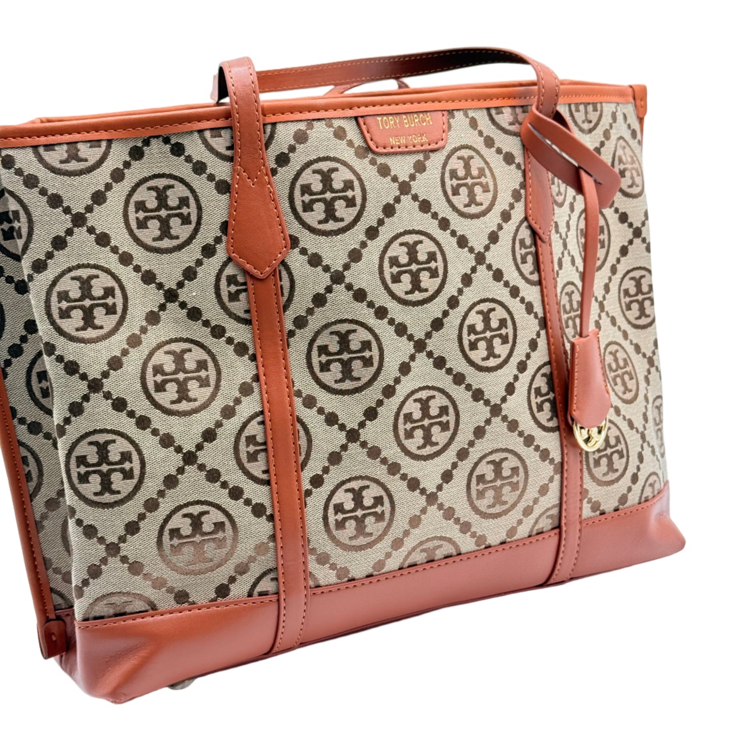 Patterned notebook with brown leather straps on a light blue background