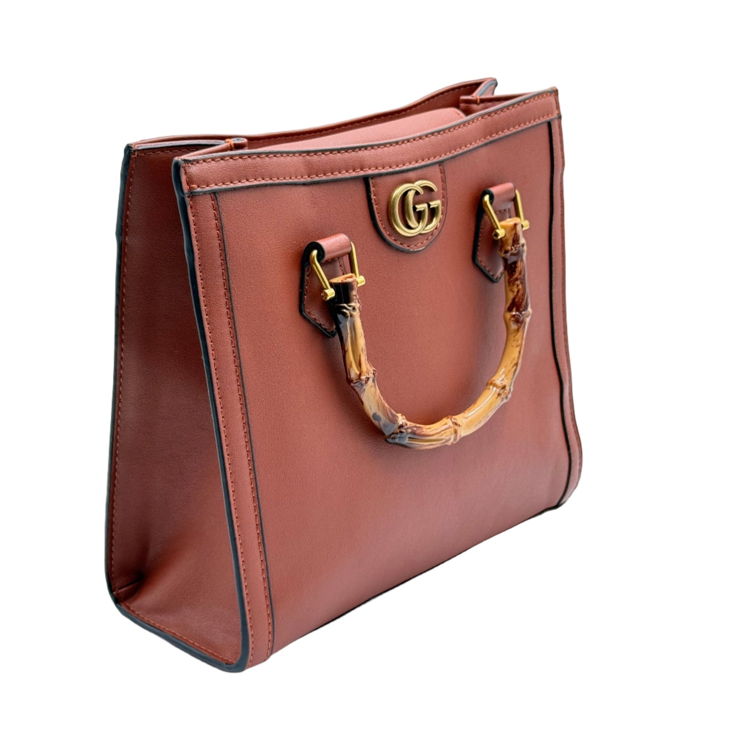 Brown handbag with gold hardware on a light gray background