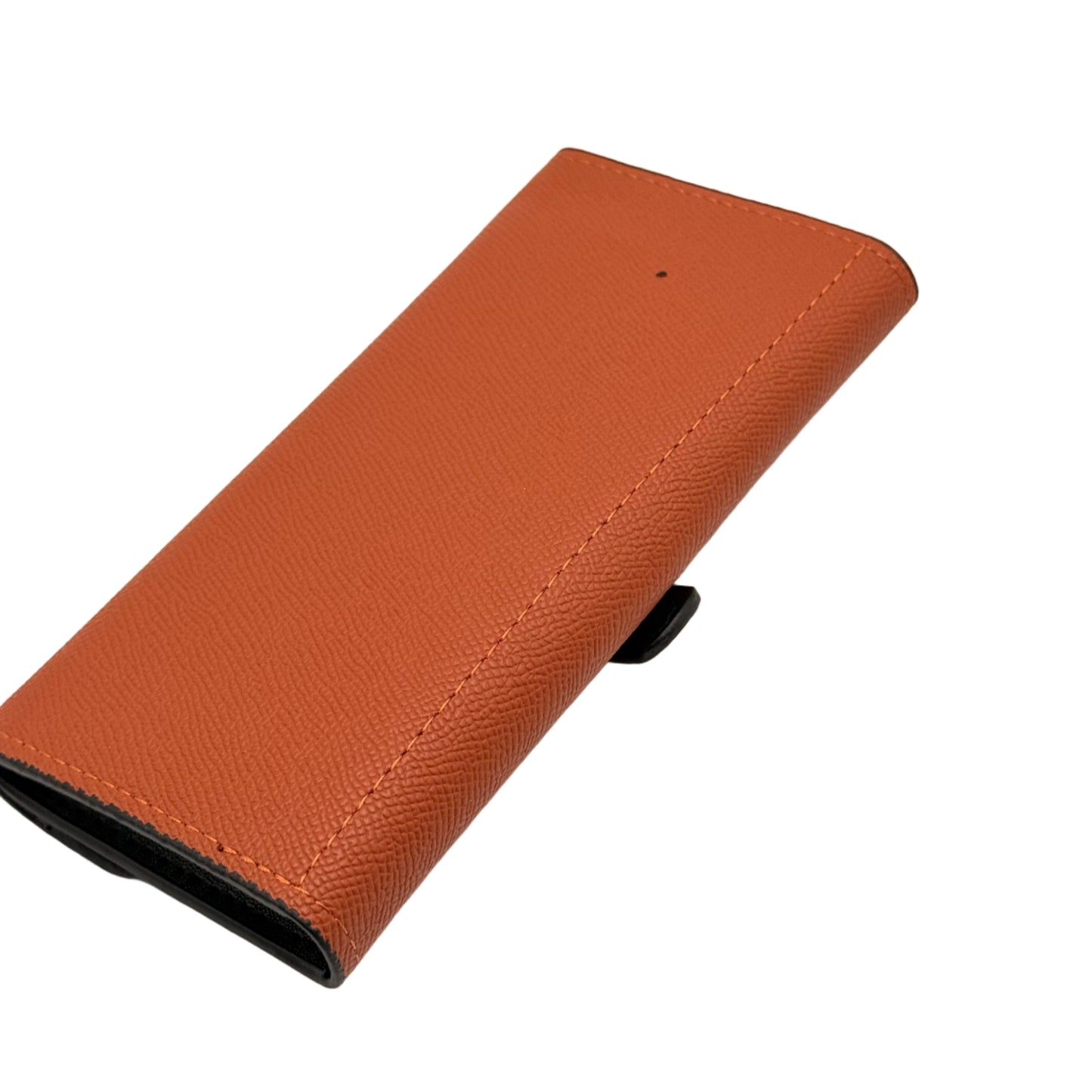 Brown leather wallet on a beige background