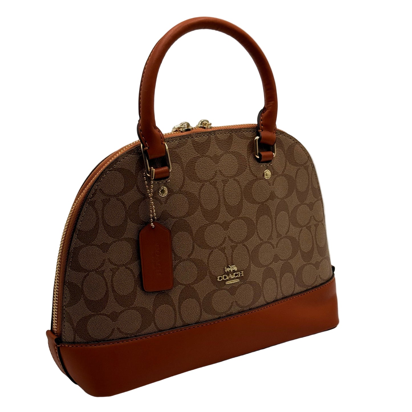 Brown handbag with a patterned design on a light gray background